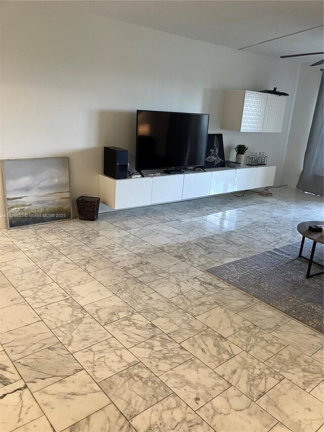 unfurnished living room featuring light tile patterned floors