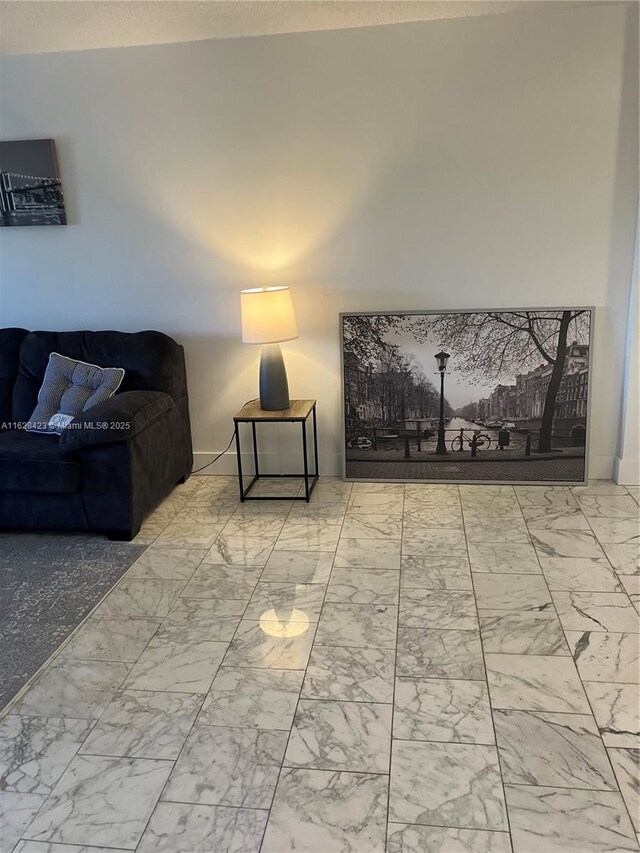 living room with light tile patterned floors