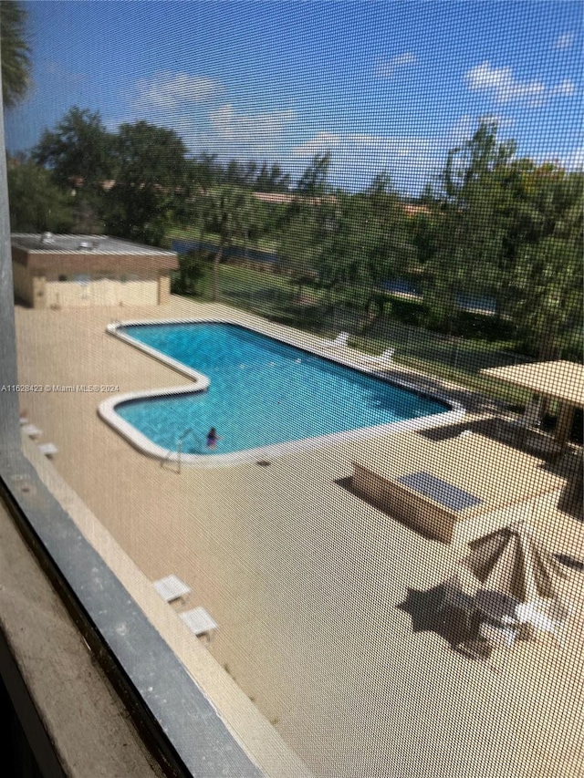 view of pool with a patio