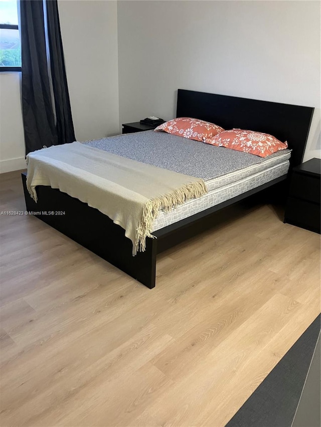 bedroom featuring light hardwood / wood-style flooring