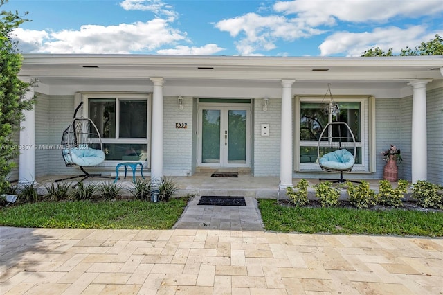 doorway to property with covered porch