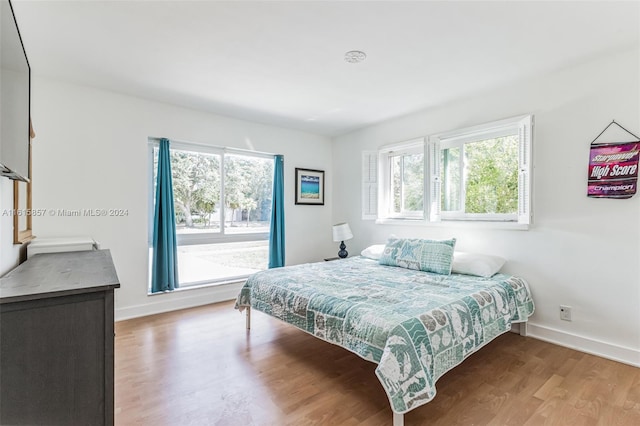 bedroom featuring hardwood / wood-style flooring