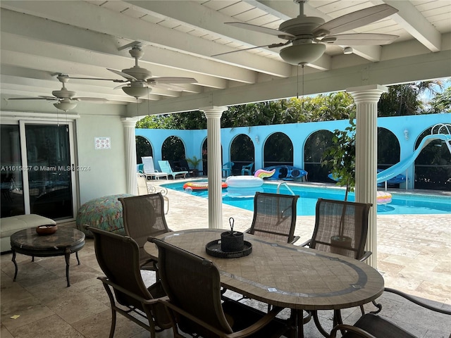 view of patio with ceiling fan