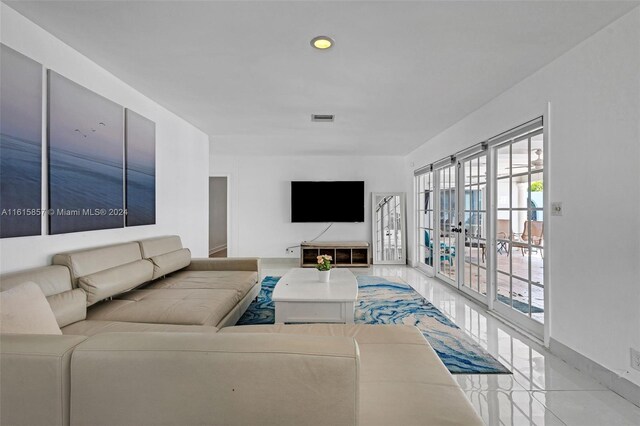 living room featuring tile patterned floors