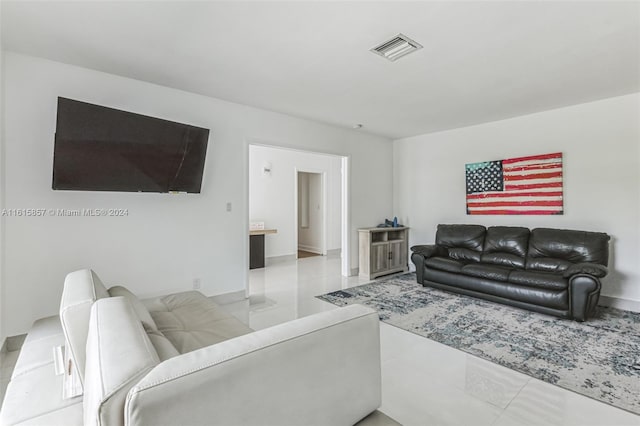 living room featuring light tile patterned floors