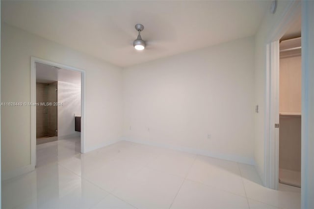 interior space featuring tile patterned floors and a closet