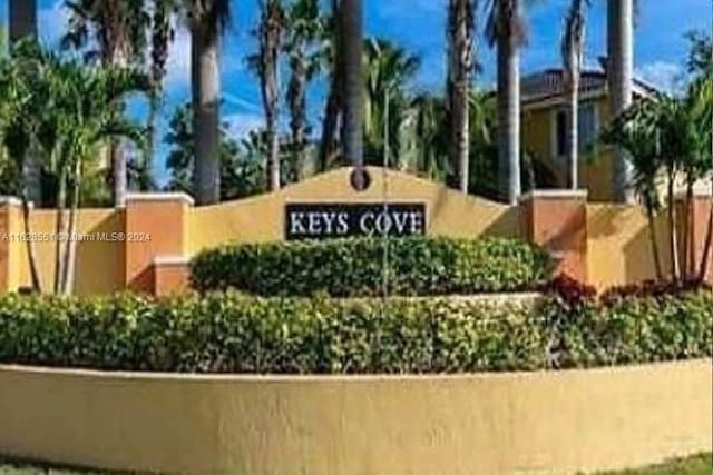 1666 SE 27th Ct Unit 108, Florida City, FL 33035 - view of community / neighborhood sign