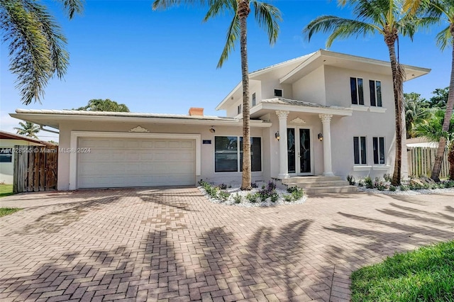 view of front of property featuring a garage