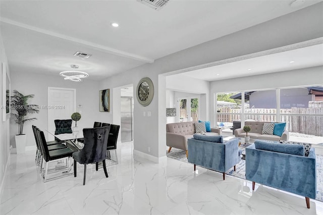 dining room with beam ceiling