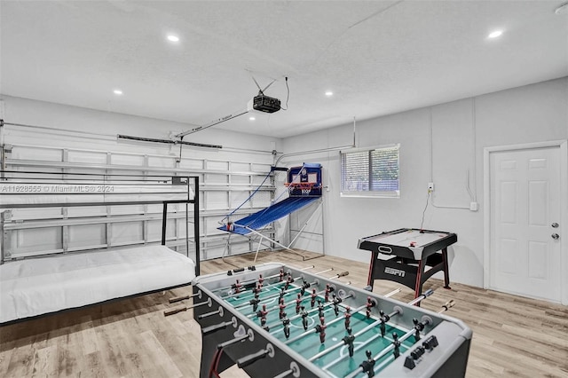 game room featuring hardwood / wood-style flooring