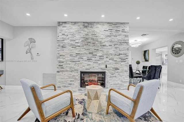 living room featuring a fireplace