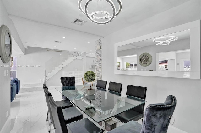 dining area with a chandelier