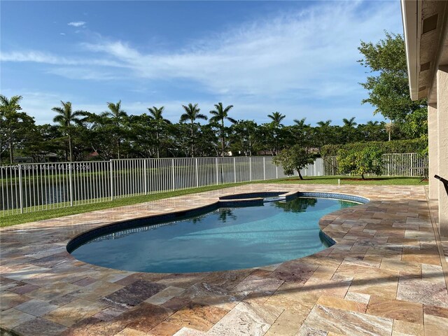 view of pool featuring a patio area