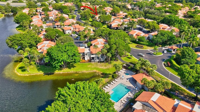 drone / aerial view with a water view