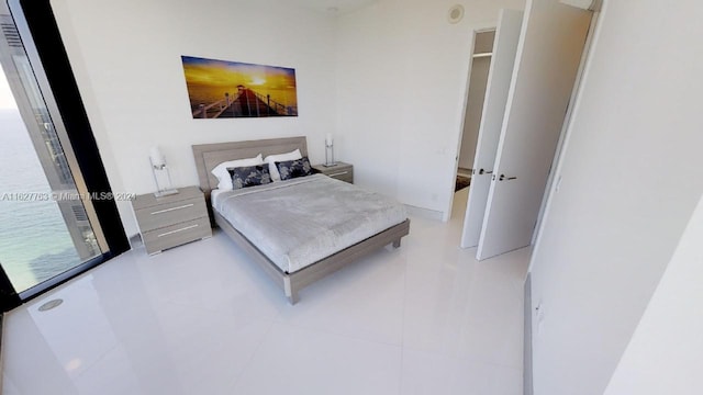 bedroom with tile patterned floors