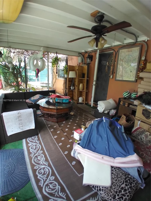 interior space featuring ceiling fan