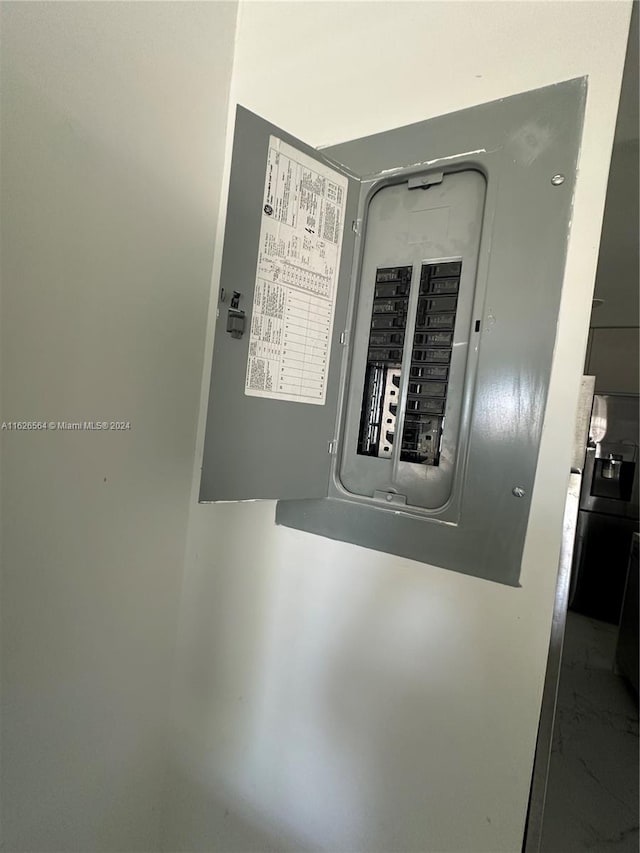 utility room featuring electric panel