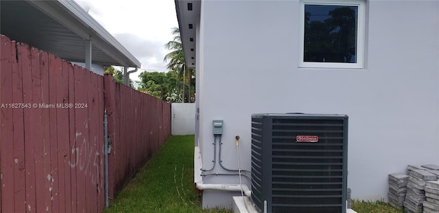 exterior details with cooling unit and electric panel