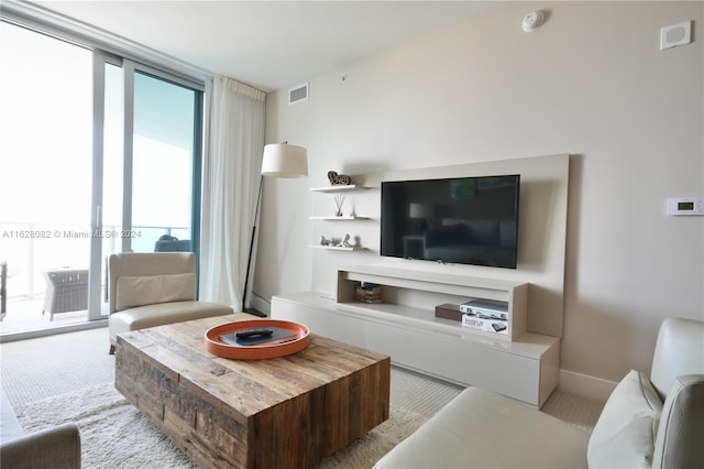 living room featuring light colored carpet