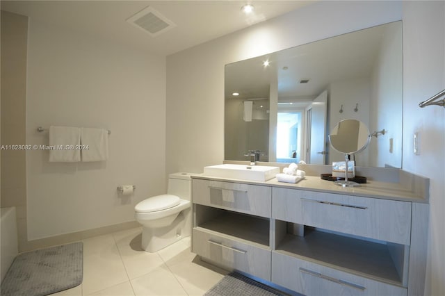 full bathroom with tile patterned floors, toilet, vanity, and tub / shower combination