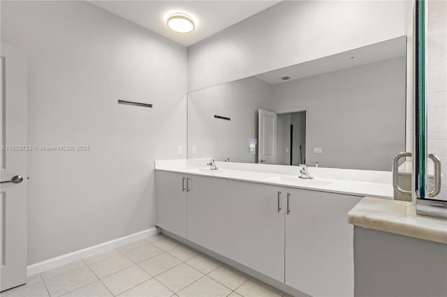 bathroom with vanity and tile patterned flooring