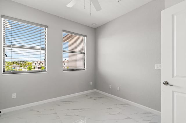 unfurnished room featuring ceiling fan