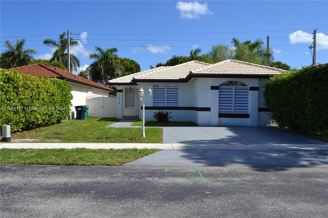 view of front of home with a front yard