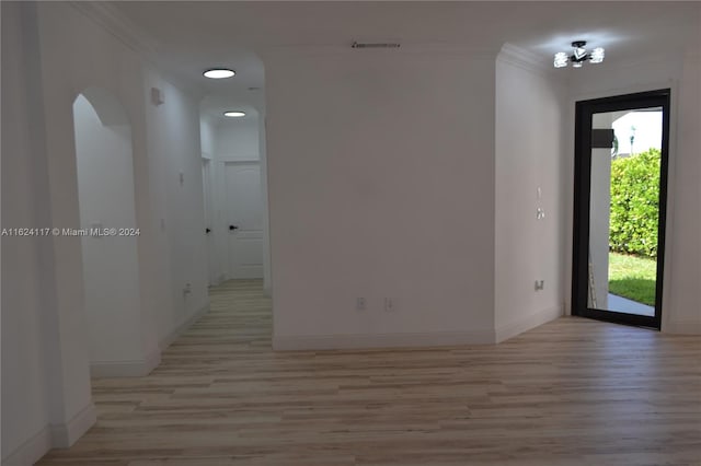 interior space with wood-type flooring and a healthy amount of sunlight