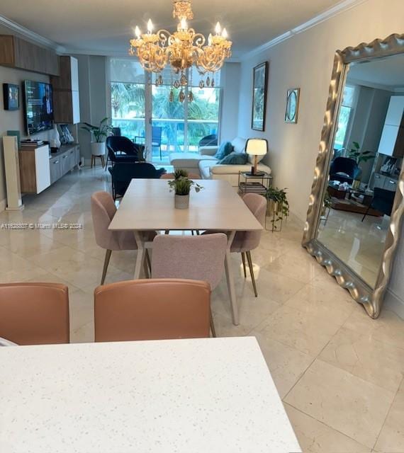 dining area with an inviting chandelier, tile patterned flooring, and ornamental molding