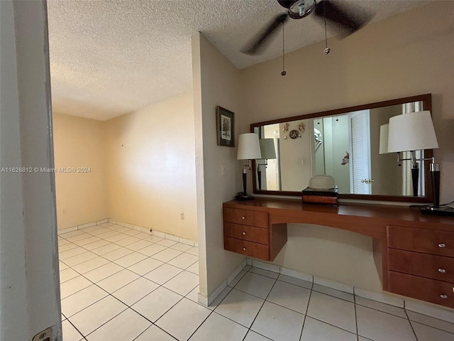3600 NE 170th St Unit 411, North Miami Beach, FL 33160 - bathroom featuring a ceiling fan, a textured ceiling, and tile patterned flooring
