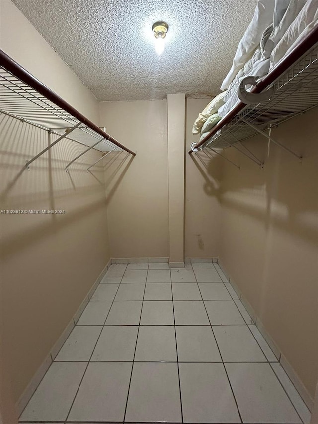 3600 NE 170th St Unit 411, North Miami Beach, FL 33160 - walk in closet with light tile patterned floors