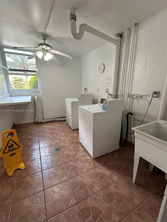 washroom with tile patterned flooring, ceiling fan, and separate washer and dryer