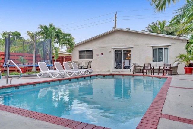 208 SW 2nd Ave, Hallandale Beach, FL 33009 - view of swimming pool with a patio and an outdoor hangout area