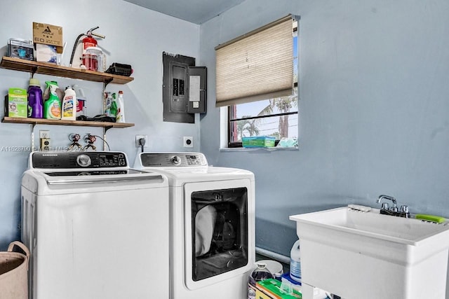 208 SW 2nd Ave, Hallandale Beach, FL 33009 - laundry area with electric panel and washing machine and clothes dryer