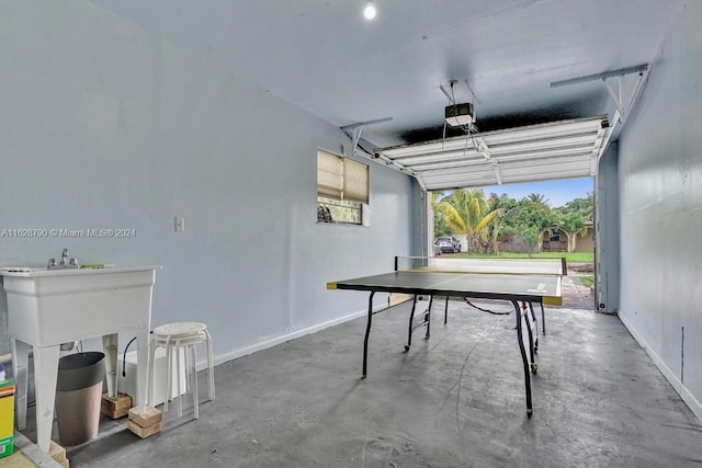 208 SW 2nd Ave, Hallandale Beach, FL 33009 - game room with a garage and concrete flooring
