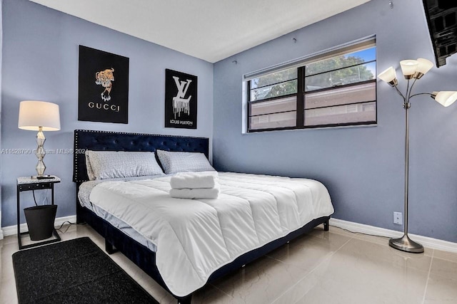 208 SW 2nd Ave, Hallandale Beach, FL 33009 - bedroom featuring baseboards