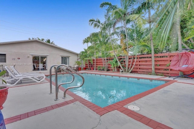 208 SW 2nd Ave, Hallandale Beach, FL 33009 - view of pool featuring a patio and a fenced backyard