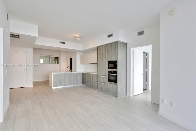 interior space with light hardwood / wood-style flooring