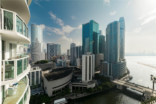 property's view of city featuring a water view