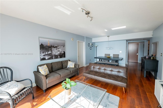 living room featuring dark hardwood / wood-style floors