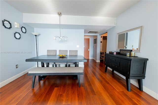 dining room featuring dark hardwood / wood-style flooring