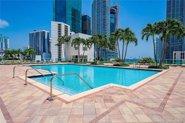 view of pool featuring a patio