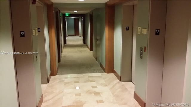 31 SE 5th St Unit 3008, Miami, FL 33131 - corridor featuring elevator and baseboards