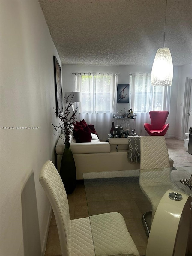 living room with a textured ceiling