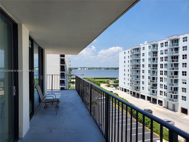 balcony featuring a water view