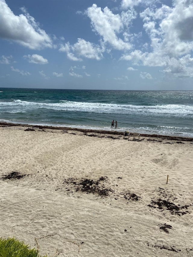 property view of water featuring a view of the beach