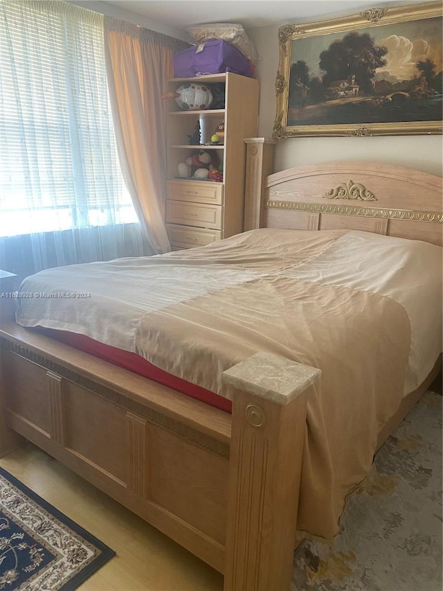 bedroom featuring light hardwood / wood-style floors