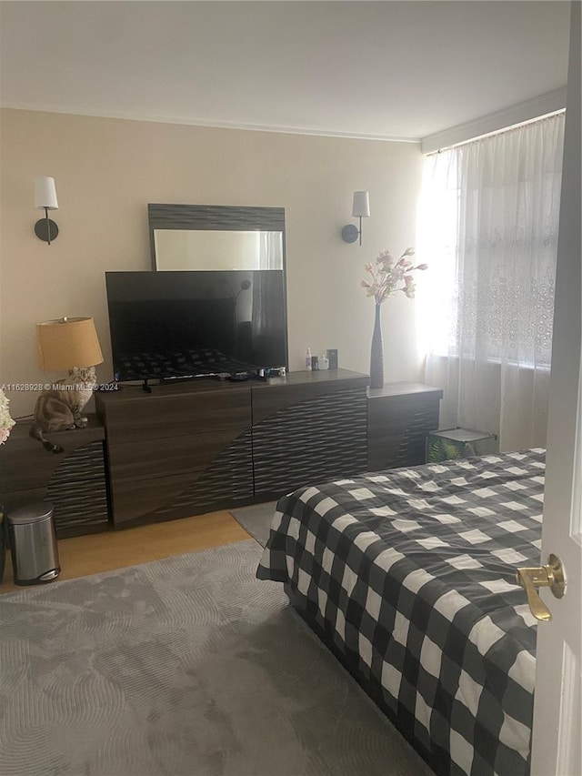 bedroom featuring hardwood / wood-style flooring