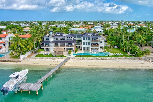 aerial view with a beach view and a water view