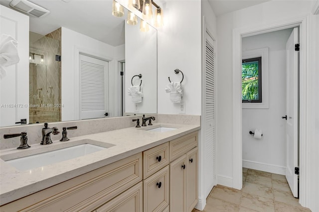 bathroom featuring walk in shower and vanity